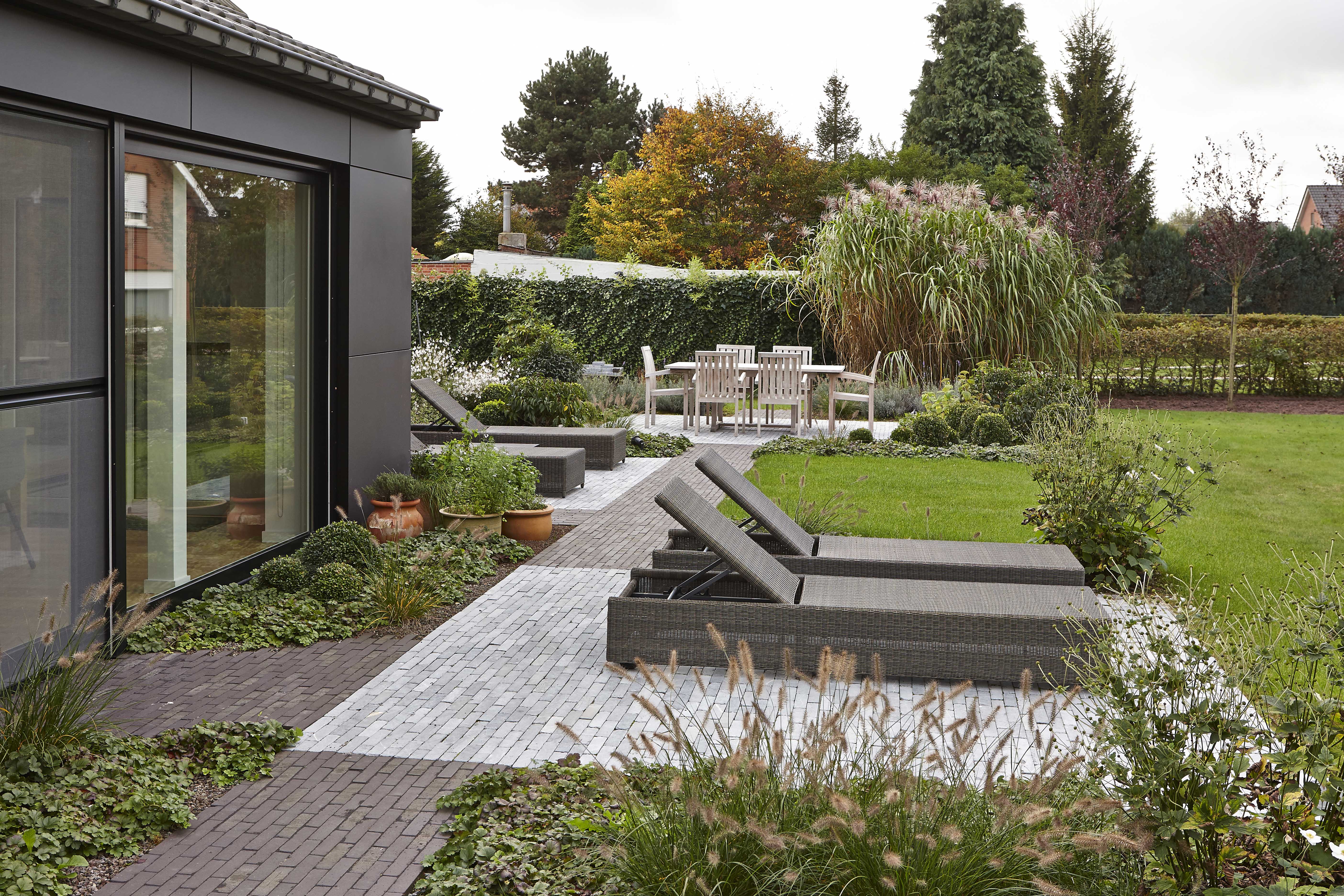 Transformation - maison mitoyenne Jardin Impressie 1